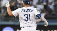 Los Angeles Dodgers outfielder Joc Pederson hits a double during Game 5 of the 2019 NLDS