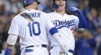 Los Angeles Dodgers teammates Joc Pederson and Justin Turner celebrate after a home run in Game 1 of the 2019 NLDS