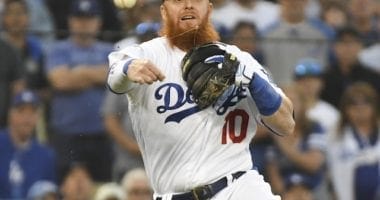 Los Angeles Dodgers third baseman Justin Turner throws to first base during Game 5 of the 2019 NLDS