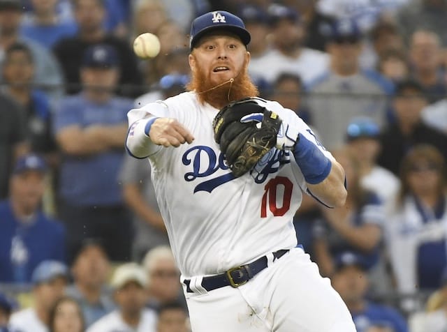 Los Angeles Dodgers third baseman Justin Turner throws to first base during Game 5 of the 2019 NLDS