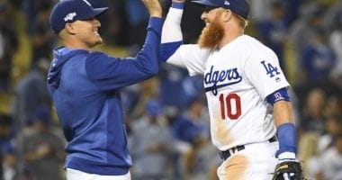 Los Angeles Dodgers teammates Kiké Hernandez and Justin Turner celebrate after winning Game 1 of the 2019 NLDS