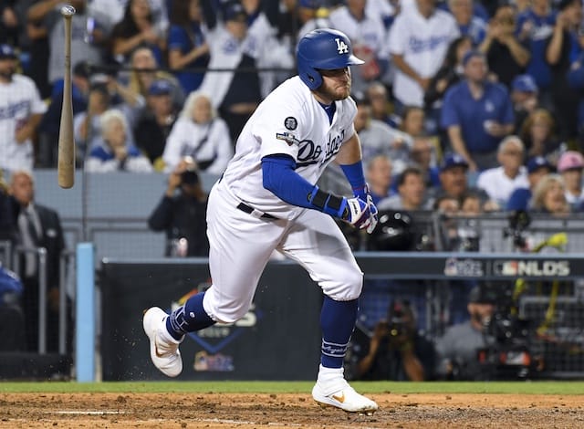 Los Angeles Dodgers infielder Max Muncy hits a two-run single against the Washington Nationals in Game 1 of the 2019 NLDS