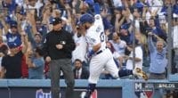 Los Angeles Dodgers infielder Max Muncy rounds the bases after hitting a home run during Game 5 of the 2019 NLDS