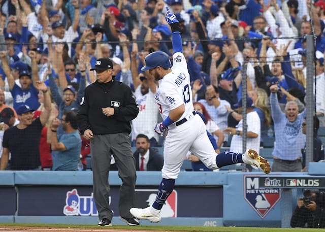 Los Angeles Dodgers infielder Max Muncy rounds the bases after hitting a home run during Game 5 of the 2019 NLDS