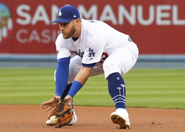 Los Angeles Dodgers infielder Max Muncy fields a ground ball during Game 1 of the 2019 NLDS