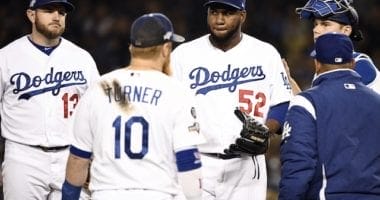 Los Angeles Dodgers manager Dave Roberts removes relief pitcher Pedro Baez from Game 2 of the 2019 NLDS