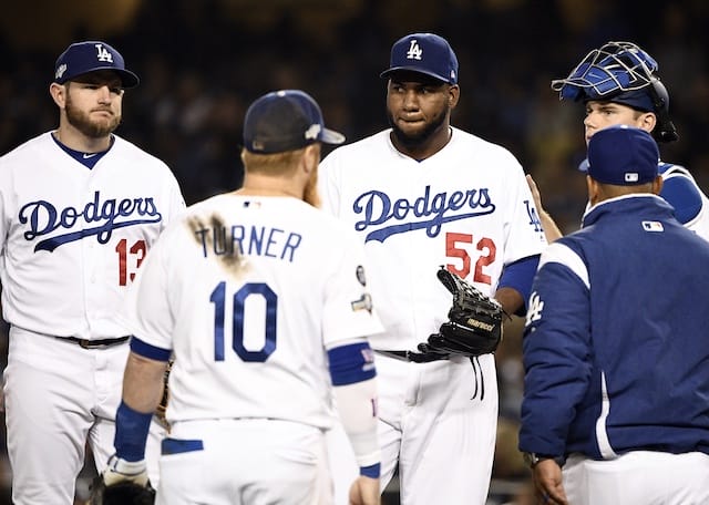 Los Angeles Dodgers manager Dave Roberts removes relief pitcher Pedro Baez from Game 2 of the 2019 NLDS