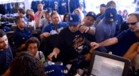 Customers purchase merchandise inside the Dodger Stadium Top of the Park store