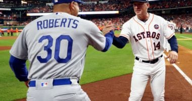 Houston Astros manager AJ Hinch greets Los Angeles Dodgers manager Dave Roberts during the 2017 World Series