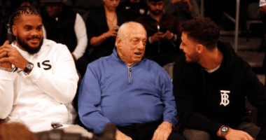Former Los Angeles Dodgers manager Tommy Lasorda with Cody Bellinger and Kenley Jansen at a Los Angeles Lakers game
