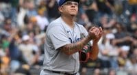 Retired Major League Baseball pitcher Fernando Valenzuela throws the  inaugural ball during the regular-season major league baseball game between  the San Diego Padres and the Los Angeles Dodgers in …