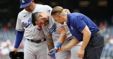 Dodgers trainer Thomas Albert, David Peralta, Dave Roberts, hit by pitch