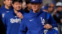 Yoshinobu Yamamoto, interpreter Yoshihiro Sonoda, Dodgers workout, 2024 Spring Training