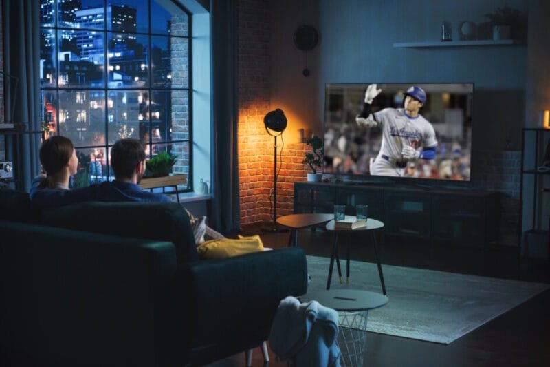 Couple Watching the Los Angeles Dodgers on TV at Home