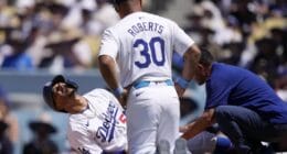 Mookie Betts, Dave Roberts, Dodgers trainer Yosuke "Possum" Nakajima, hit by pitch